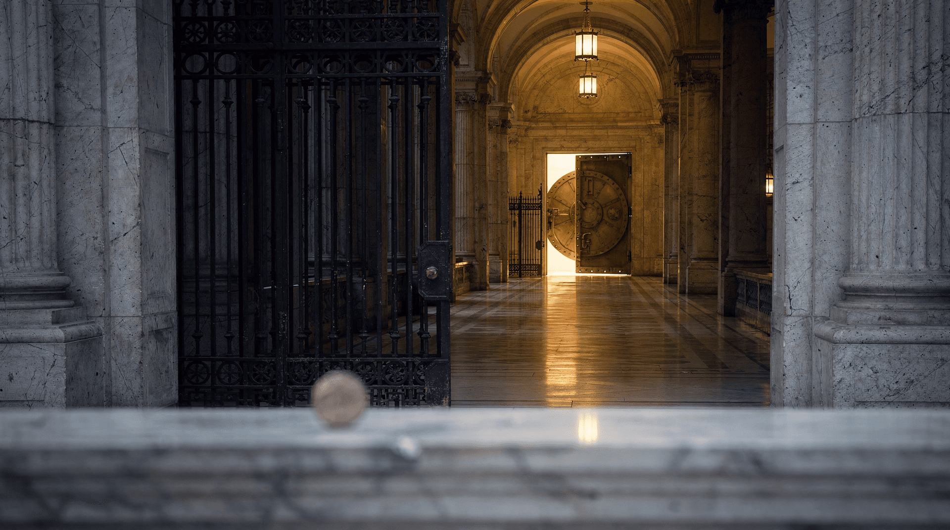 Marble corridor splitting into a gated path and an open path leading to a glowing vault door